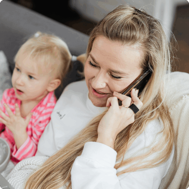 Woman with child making a phone call