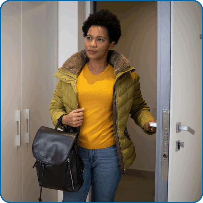 Woman walks into her own apartment
