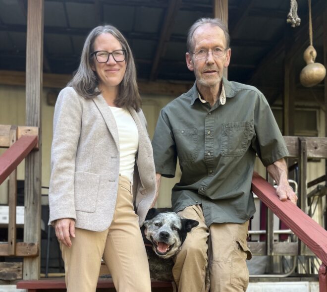 Curtis and Julia on his front porch with his dog